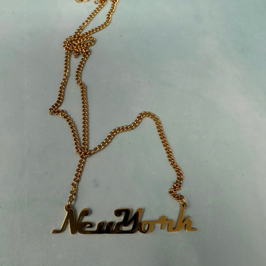 New York gold necklace with modern minimal design
