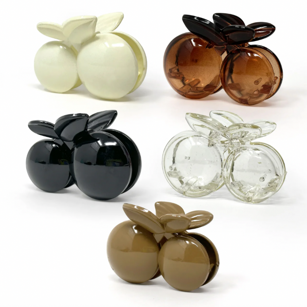 Oversized acrylic cherry hair claw clip in neutral tones with double-ball fruit design and strong grip