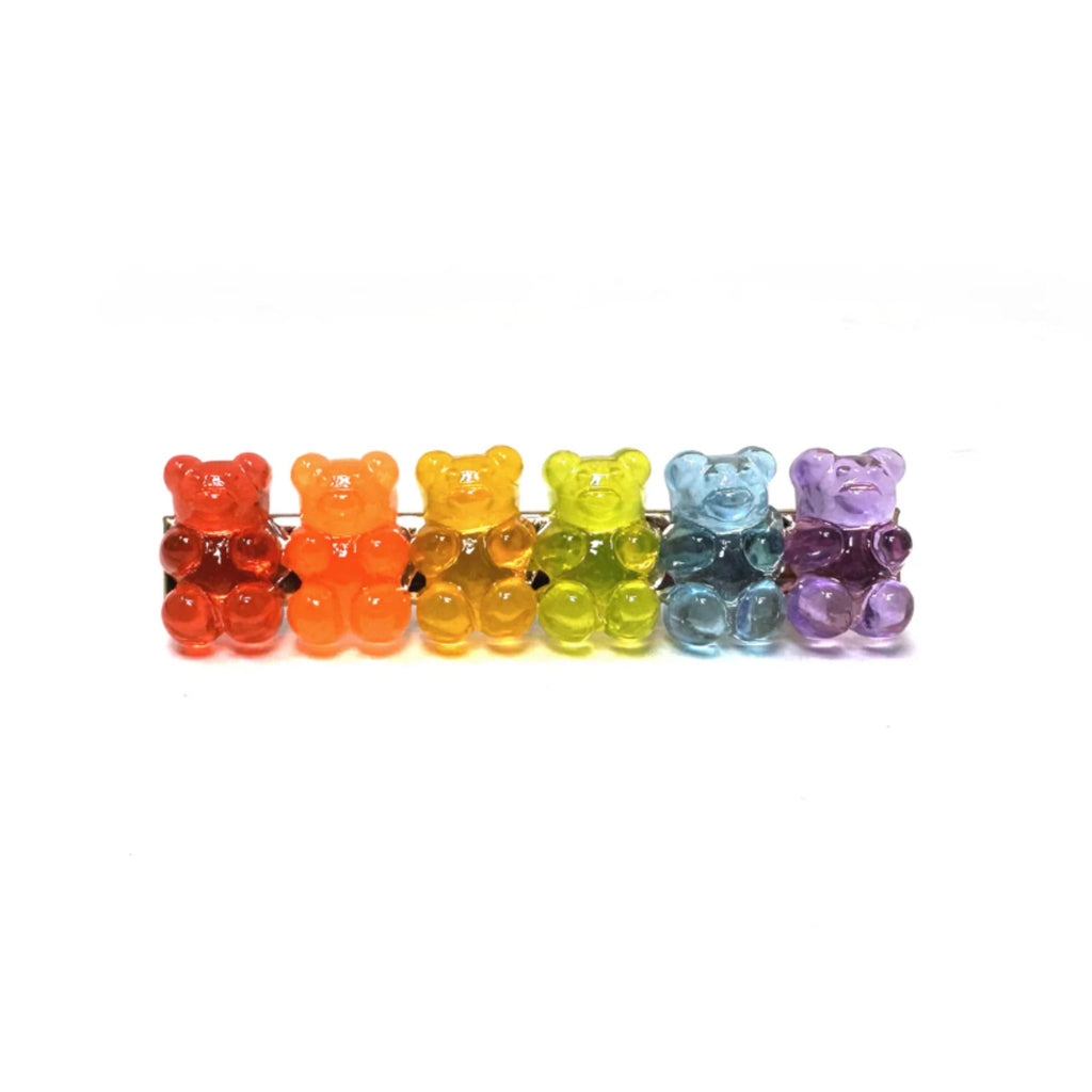 Set of two candy-inspired gummy bear barrettes with colorful bear designs, available in 6 Across (2.5"W x 0.75"H) and 5 Across (2.25"W x 0.75"H) styles, featuring sturdy alligator clip backings.