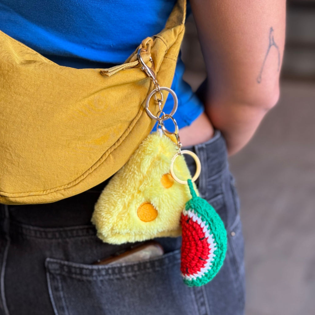 Yellow plush triangle cheese keychain with embroidered holes, approx. 4 inches tall