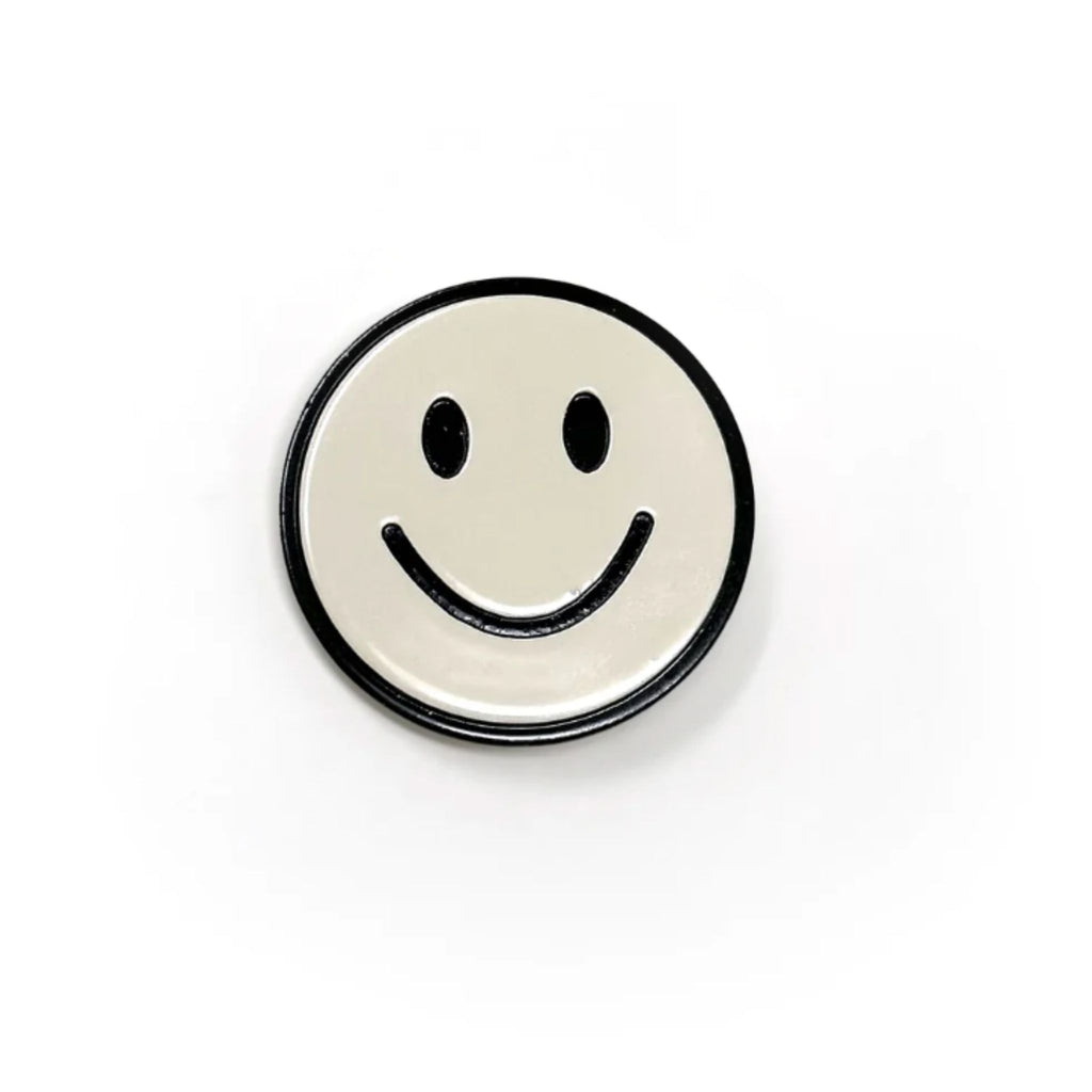 Set of two black and white smiley face hair clips with alligator clip backing, each measuring approximately 1.25" in diameter.