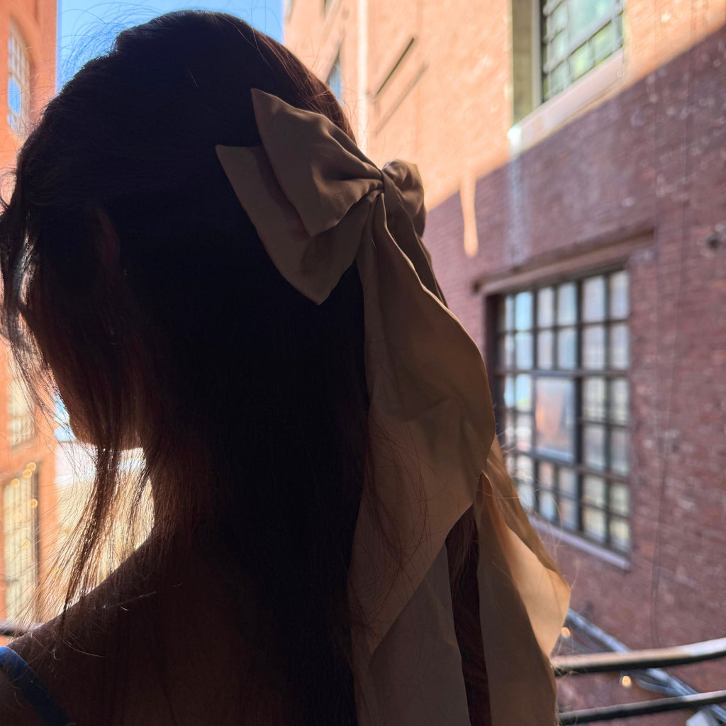 Luxurious satin Victoria hair bow in soft, elegant hues — perfect for parties, weddings, or holiday gifting.