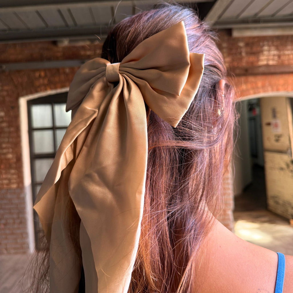 Luxurious satin Victoria hair bow in soft, elegant hues — perfect for parties, weddings, or holiday gifting.