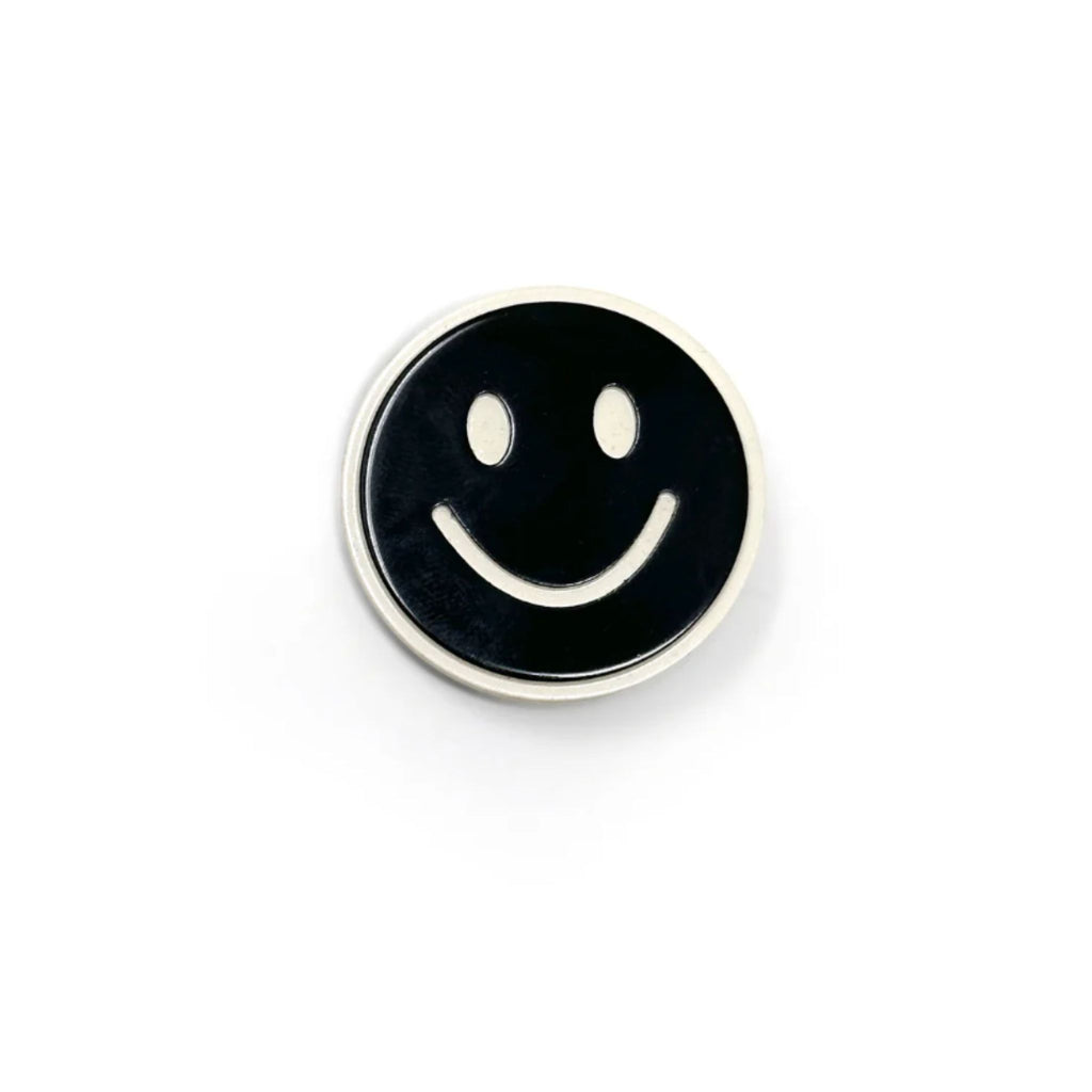 Set of two black and white smiley face hair clips with alligator clip backing, each measuring approximately 1.25" in diameter.