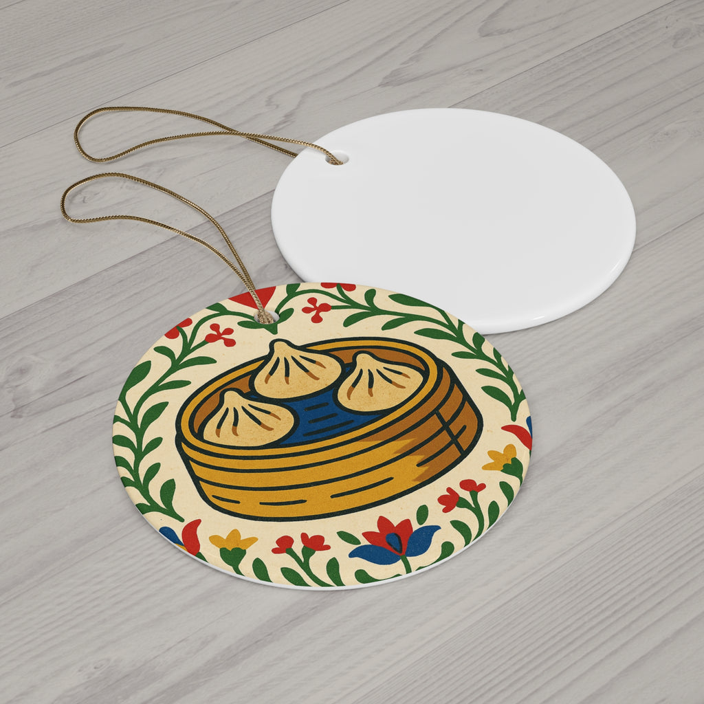 Ceramic ornament with soup dumpling design and folk floral border