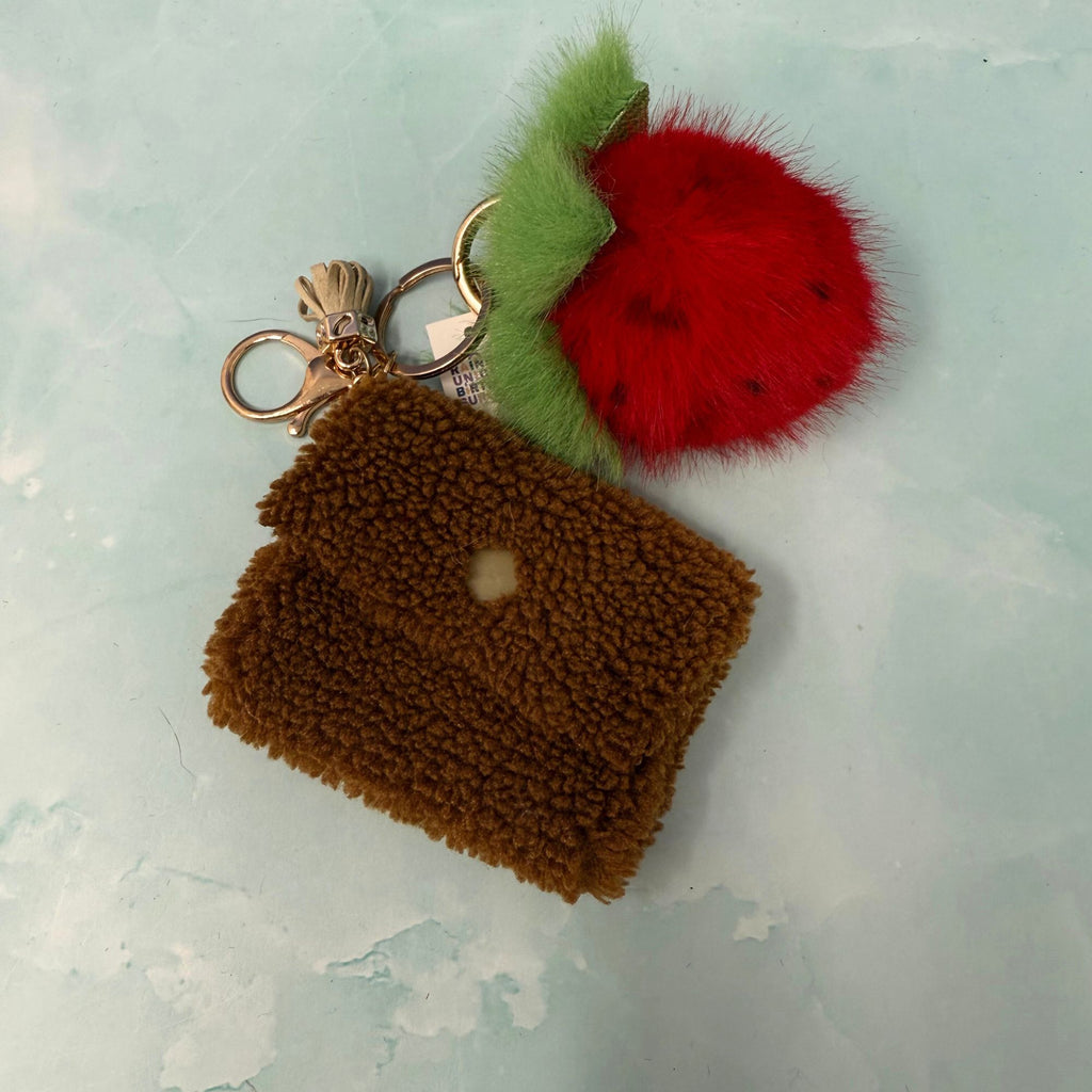 Fluffy strawberry keychain with faux fur berry charm and brown sherpa pouch on gold keyring