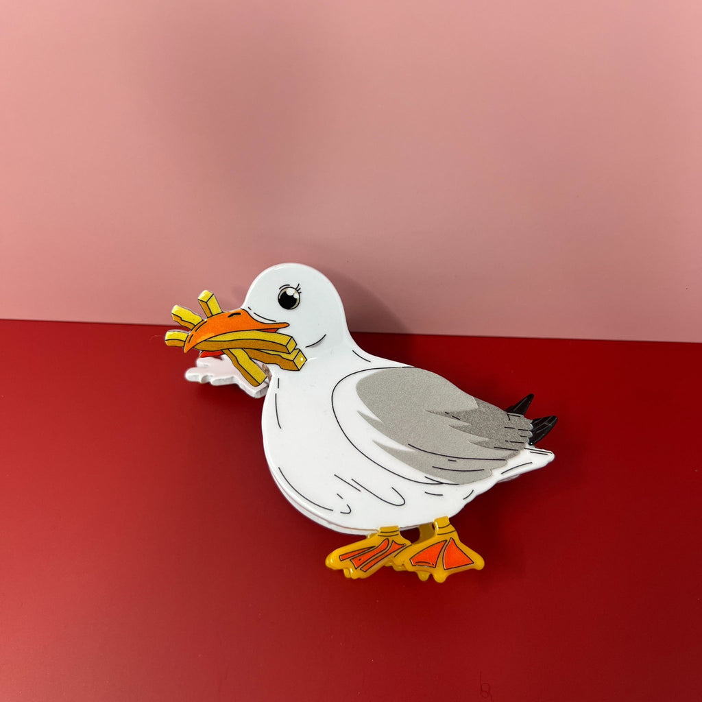 Seagull hair claw clip holding french fries, white and grey acetate design