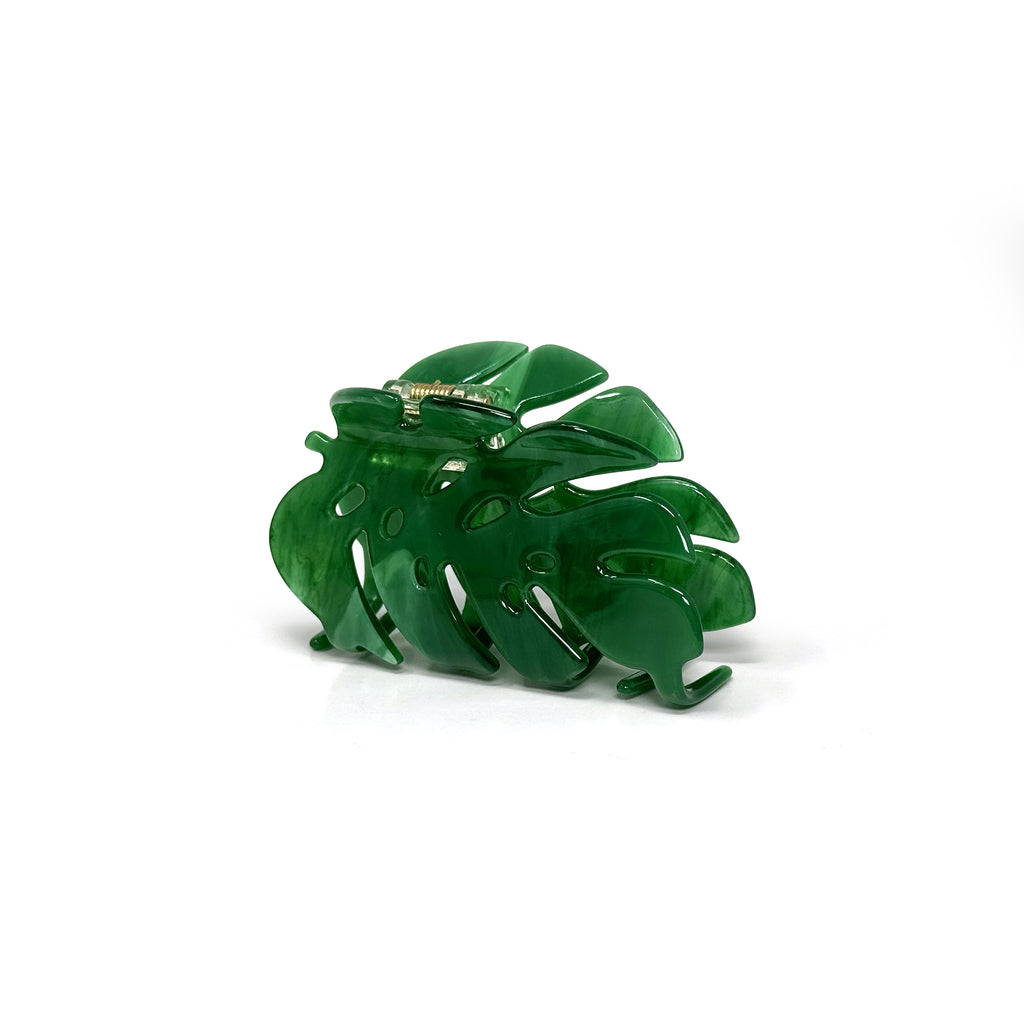 "Monstera leaf hair claw clip with a chic tropical-inspired design."