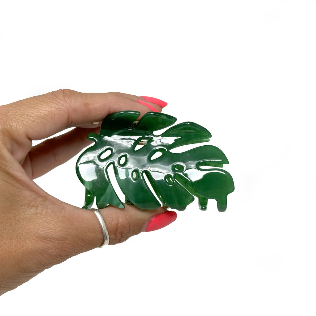 "Monstera leaf hair claw clip with a chic tropical-inspired design."