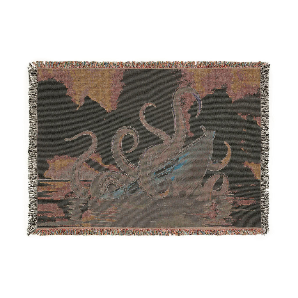 Colorful Kraken-themed woven cotton blanket with decorative fringe, perfect for cozy home decor or gifting.